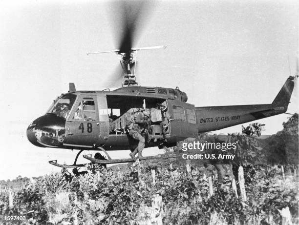 Strike Force soldiers of the U.S. Army 101st Airborne leap from helicopter in an air strike near Phan Thiet, Vietnam, March 28, 1967.