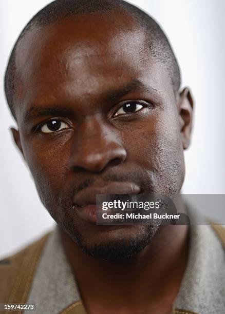 Actor and producer Gbenga Akinnagbe poses for a portrait at the Photo Booth for MSN Wonderwall At ChefDance on January 19, 2013 in Park City, Utah.