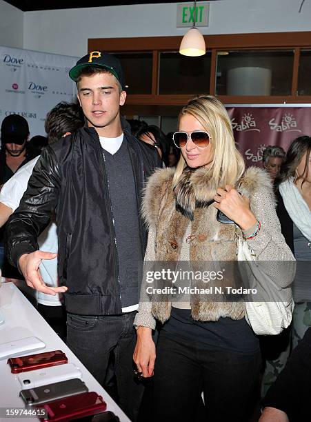 River Viiperi and Paris Hilton attend the TR Suites Daytime Lounge - Day 2 on January 19, 2013 in Park City, Utah.