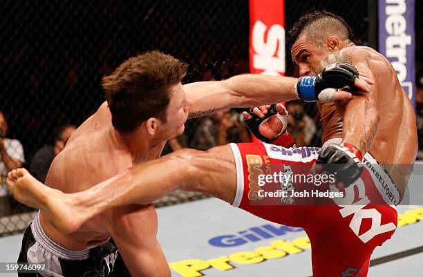 Vitor Belfort kicks Michael Bisping in their middleweight fight at the UFC on FX event on January 19, 2013 at Ibirapuera Gymnasium in Sao Paulo,...