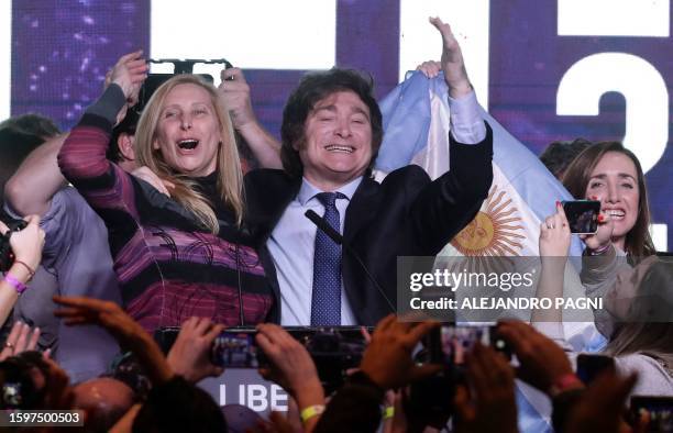 Argentine far-right libertarian economist and presidential candidate Javier Milei celebrates the results of the primary elections with his sister...