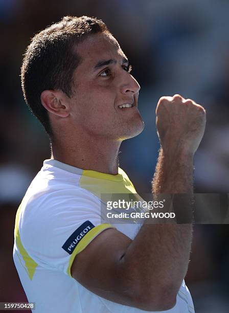 Spain's Nicolas Almagro gestures after victory in his men's singles match against Serbia's Janko Tipsarevic on the seventh day of the Australian Open...