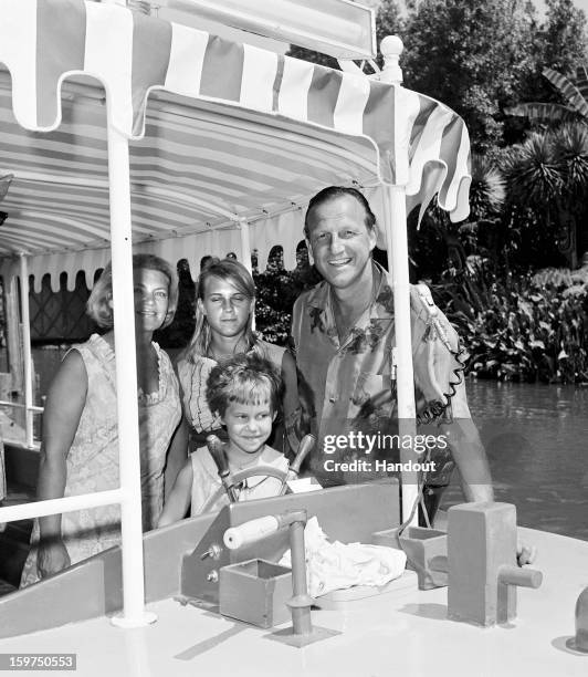 In this handout photo provided by Disney Parks, Baseball legend Stan Musial and his family are seen on the Jungle Cruise attraction at Disneyland...