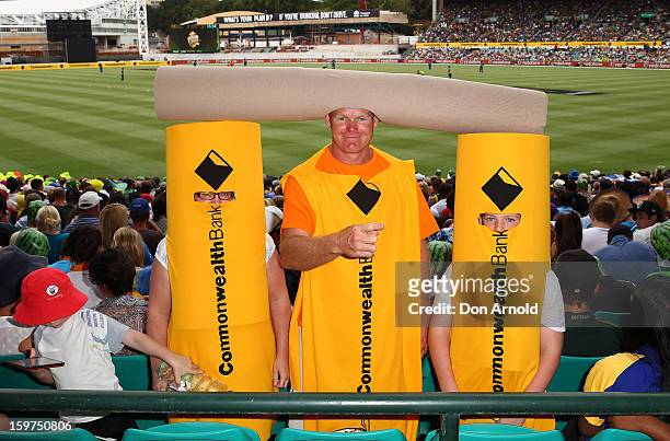 Cricket fans dressed up in costume look on during game four of the Commonwealth Bank one day international series between Australia and Sri Lanka at...