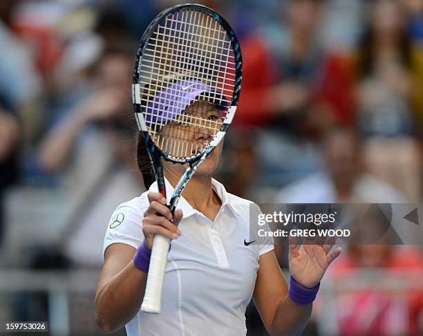 China's Li Na celebrates victory after her women's singles match against Germany's Julia Goerges on the seventh day of the Australian Open tennis...