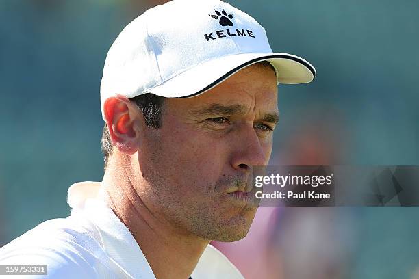 Jamie Harnwell, coach of the Glory looks on after being defeated in a penalty shoot out during the W-League Semi Final match between Perth Glory and...