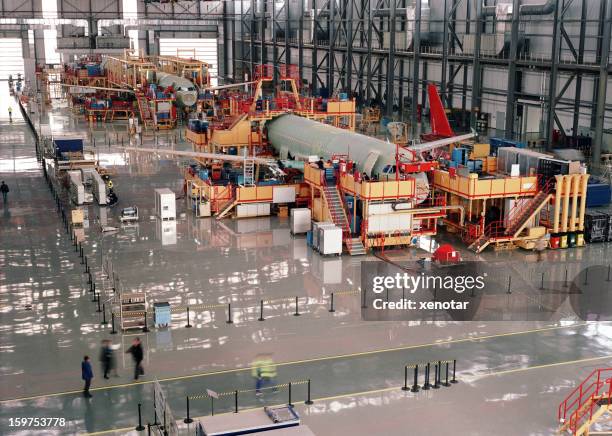 aircraft assembly line - air vehicle stock pictures, royalty-free photos & images