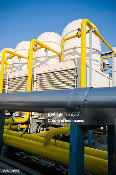 sets of cooling towers in conditioning systems - chillar stock pictures, royalty-free photos & images