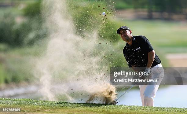 David Howell of England plays out of a bunker on the 7th hole during day four of the Abu Dhabi HSBC Golf Championship at Abu Dhabi Golf Club on...