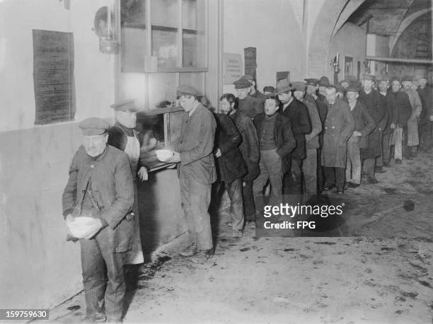 Soup kitchen in Berlin, during a period of heavy inflation, circa 1923.