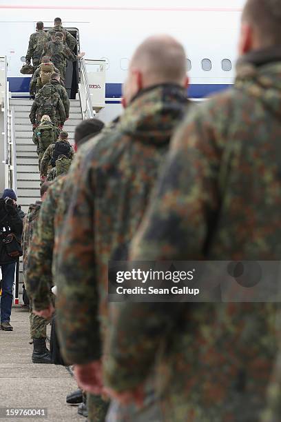 Contingent of approximately 240 soldiers of the German Bundeswehr board a plane for Turkey on January 20, 2013 in Berlin, Germany. German is...