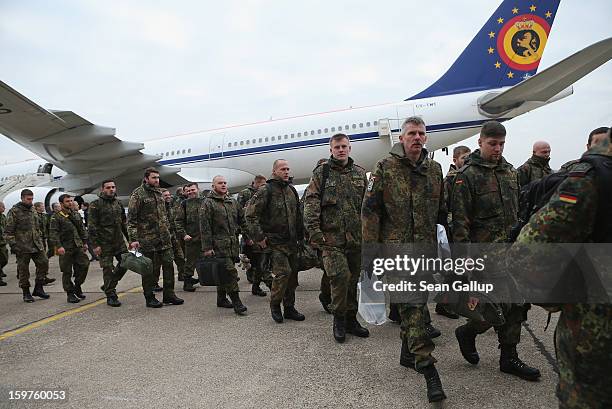 Contingent of approximately 240 soldiers of the German Bundeswehr arrive to board a plane for Turkey on January 20, 2013 in Berlin, Germany. German...