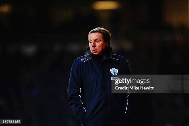 Harry Redknapp the Queens Park Rangers manager watches from the touchline during the Barclays Premier League match between West Ham United and Queens...