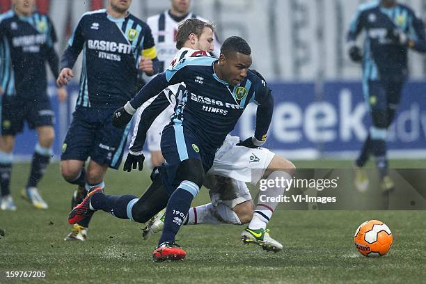 Jens Podevijn of Willem II, Rydell Poepon of ADO Den Haag during the Dutch Eredivise match between Willem II and ADO Den Haag at the Koning Willem II...