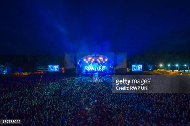crowd attending music festival - summer lights stockfoto's en -beelden