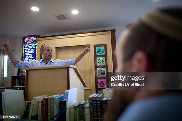 Naftali Bennett, head of HaBayit HaYehudi Party, the Jewish Home party, campaigns at a pre-army training school at the Shapira Center on January 20,...