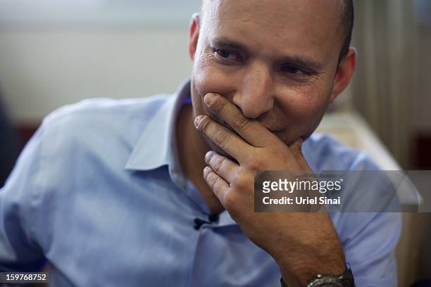 Naftali Bennett, head of HaBayit HaYehudi Party, the Jewish Home party, looks on as he talks to students at a pre-army training school as he...