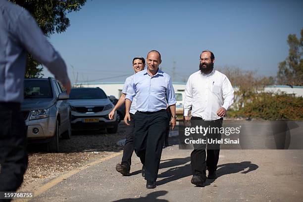 Naftali Bennett , head of HaBayit HaYehudi Party, the Jewish Home party, arrives at a pre-army training school as he campaigns at the Shapira Center...