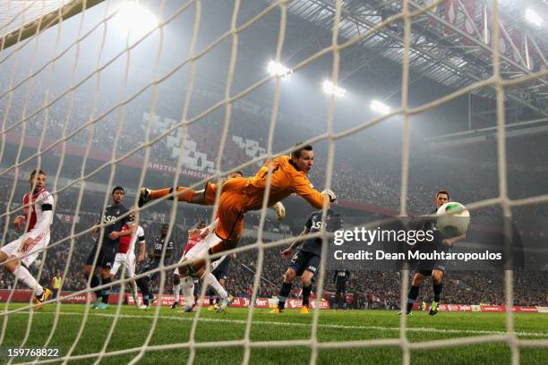 Siem De Jong of Ajax gets a touch on the ball to put the ball past goalkeeper, Erwin Mulder of Feyenoord during the Eredivisie match between Ajax...