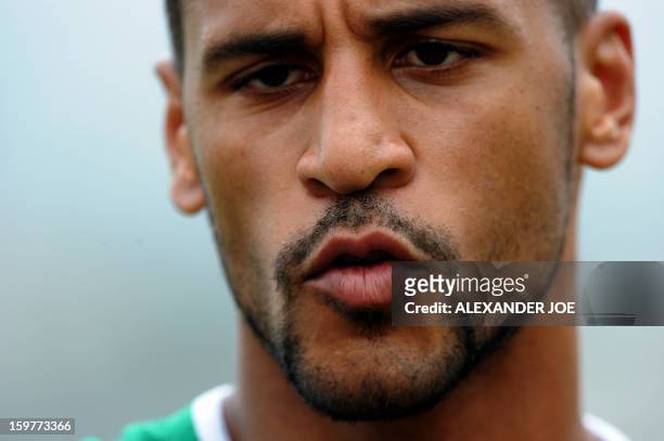 Togo's Midfielder Aleixys Romao speaks to the press after a training session in Moruleng on January 20, 2013 at Moruleng Stadium. Togo will play...