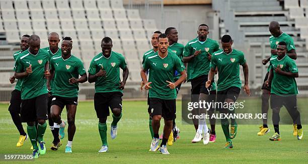 Players of the Togo's football national team take part in a training session in Moruleng on January 20, 2013 at Moruleng Stadium. Togo will play...