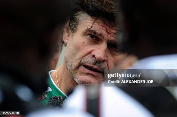 Togo's French Coach Didier Six talks to the media after a training session on January 20, 2013 at Moruleng Stadium in Moruleng, on the eve of a Group...