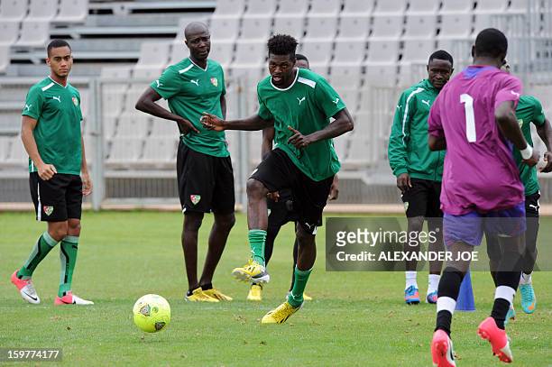 Players of the Togo's football national team take part in a training session in Moruleng on January 20, 2013 at Moruleng Stadium. Togo will play...