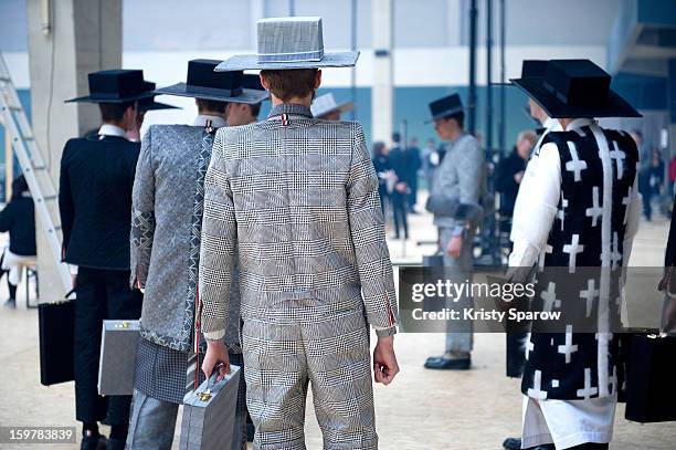 Models are seen backstage before the Thom Browne Menswear Autumn / Winter 2013/14 show as part of Paris Fashion Week on January 20, 2013 in Paris,...