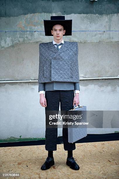 Model is seen backstage before the Thom Browne Menswear Autumn / Winter 2013/14 show as part of Paris Fashion Week on January 20, 2013 in Paris,...