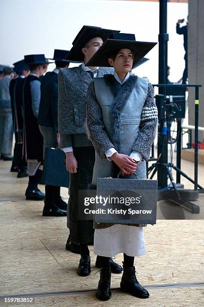 Models are seen backstage before the Thom Browne Menswear Autumn / Winter 2013/14 show as part of Paris Fashion Week on January 20, 2013 in Paris,...