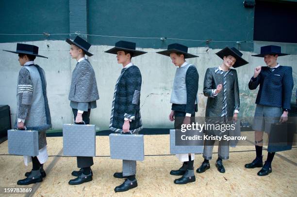 Models are seen backstage before the Thom Browne Menswear Autumn / Winter 2013/14 show as part of Paris Fashion Week on January 20, 2013 in Paris,...