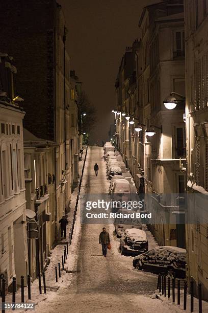 Snow covers the ground of Montmartre neighborhood on January 19 in Paris, France. Heavy snowfall fell throughout Europe and the UK causing travel...