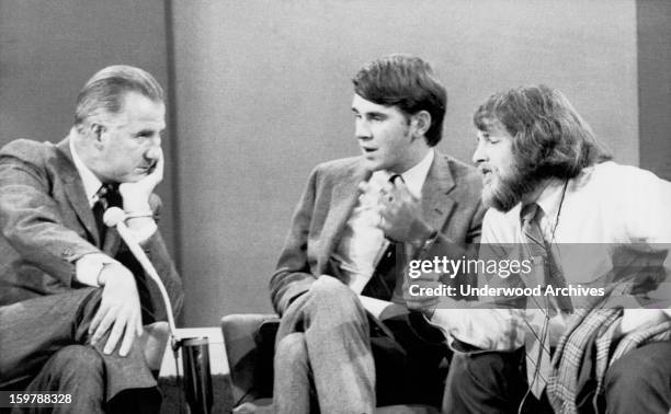 Vice President Spiro T. Agnew listens as a University of Washington student Richard Silverstein makes a point as Yale Law School student Gregory...