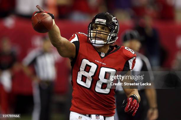 Tight end Tony Gonzalez of the Atlanta Falcons celebrates after catching a 10-yard touchdown in the second quarter against the San Francisco 49ers in...