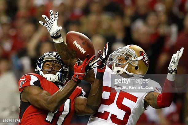 Cornerback Tarell Brown of the San Francisco 49ers breaks up a pass to wide receiver Julio Jones of the Atlanta Falcons in the second half in the NFC...
