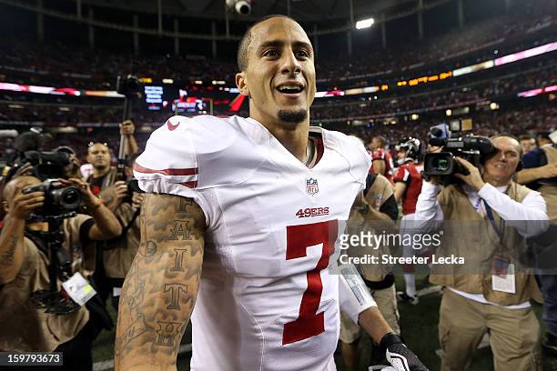 Colin Kaepernick of the San Francisco 49ers celebrates on the field after the 49ers won 28-24 against the Atlanta Falcons in the NFC Championship...