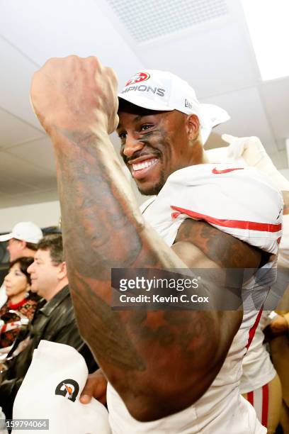 Vernon Davis of the San Francisco 49ers celebrates in the locker room after the 49ers defeat the Atlanta Falcons 28-24 in the NFC Championship game...