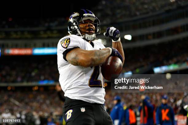 Ray Rice of the Baltimore Ravens celebrates after scoring a touchdown in the second quarter against the New England Patriots during the 2013 AFC...
