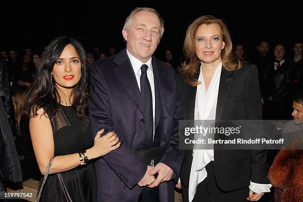 Salma Hayek, Francois-Henri Pinault and Valerie Trierweiler attend the Saint Laurent Men Autumn / Winter 2013 show at Grand Palais as part of Paris...