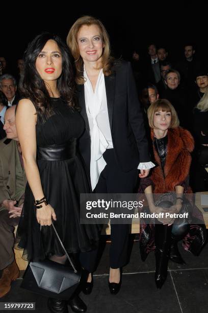 Salma Hayek, Valerie Trierweiler and Anna Wintour attend the Saint Laurent Men Autumn / Winter 2013 show at Grand Palais as part of Paris Fashion...