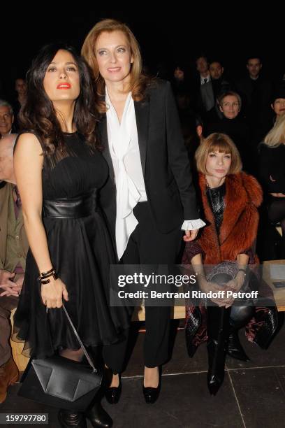 Salma Hayek, Valerie Trierweiler and Anna Wintour attend the Saint Laurent Men Autumn / Winter 2013 show at Grand Palais as part of Paris Fashion...