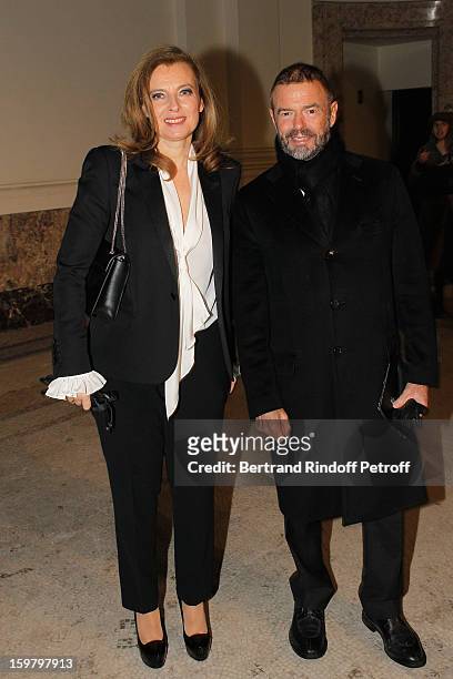 Valerie Trierweiler and Jean-Paul Cluzel attend the Saint Laurent Men Autumn / Winter 2013 show at Grand Palais as part of Paris Fashion Week on...