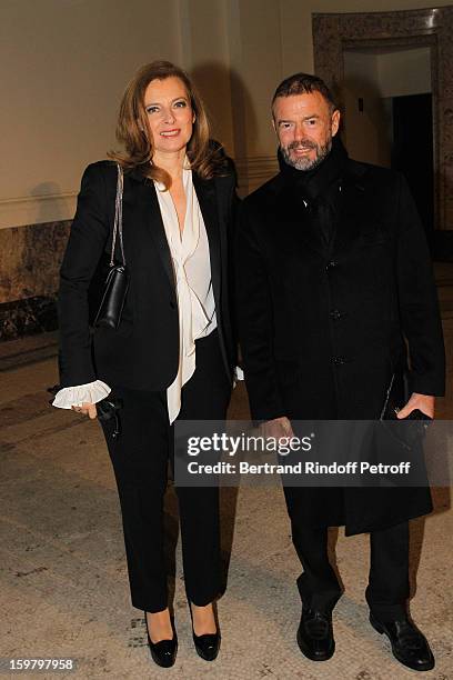 Valerie Trierweiler and Jean-Paul Cluzel attend the Saint Laurent Men Autumn / Winter 2013 show at Grand Palais as part of Paris Fashion Week on...