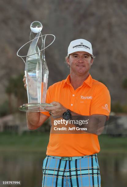 Brian Gay poses with the trophy after winning the Humana Challenge In Partnership With The Clinton Foundation at the Palmer Private Course at PGA...