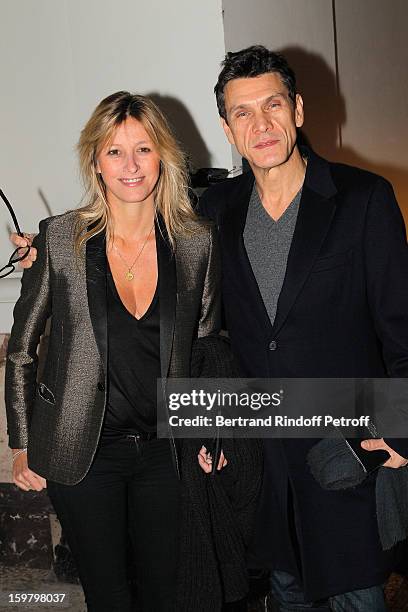Marc Lavoine and his wife Sarah attend the Saint Laurent Men Autumn / Winter 2013 show at Grand Palais as part of Paris Fashion Week on January 20,...