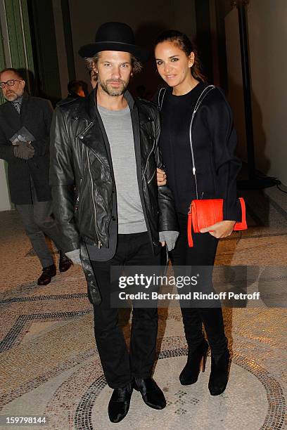 Aaron Young and Laure Heriard Dubreuil attend the Saint Laurent Men Autumn / Winter 2013 show at Grand Palais as part of Paris Fashion Week on...