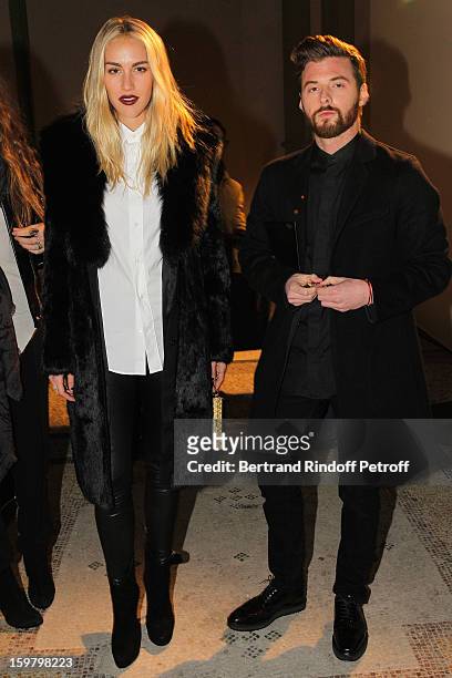 Beth Whitson and Andy Pompei attend the Saint Laurent Men Autumn / Winter 2013 show at Grand Palais as part of Paris Fashion Week on January 20, 2013...