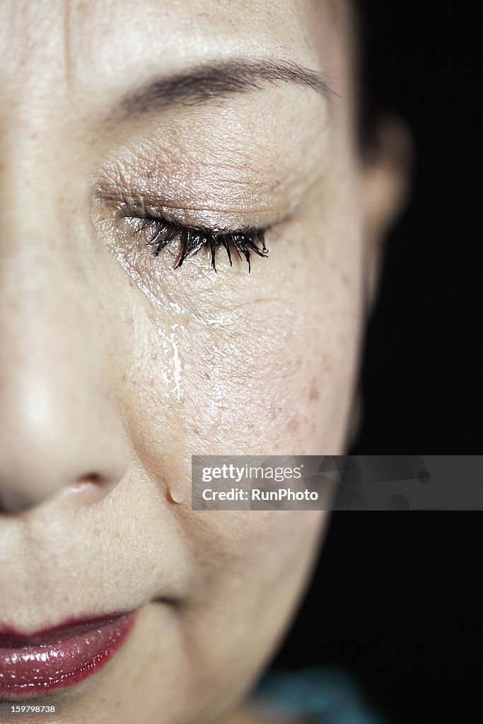 Old aged woman crying