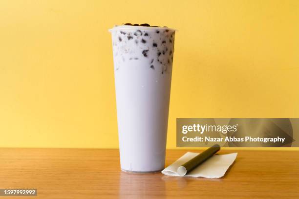 creamy taro milk tea. - nazar abbas photography stock pictures, royalty-free photos & images