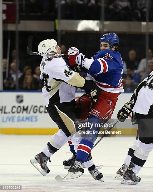 Brooks Orpik of the Pittsburgh Penguins steps into Brian Boyle of the New York Rangers in the second period at Madison Square Garden on January 20,...